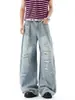 Jeans rotos lavados estilo americano para hombres y mujeres, estilo high street de otoño e invierno, pantalones curvos geniales y elegantes, pantalones de pierna ancha con vibra vintage