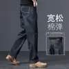 Jeans escuro de alta qualidade para homens, estilo reto solto, coleção primavera/outono, novo modelo 2026, calça business casual para homens de meia-idade