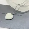 Explosiones al por mayor Collar de piedra natural de amor jade corazón de melocotón cristal en forma de corazón cadena de clavícula amor de amantes regalo de cumpleaños