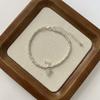 Pulseira retrô de luxo leve estilo francês feminina design de nicho personalidade avançada estilo frio simples joias requintadas da sorte