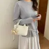 Bolso Cubo de Moda Versátil para Mujer 2026 Nuevo Estilo de Verano Bolso de Mano Texturizado Bolso Cruzado al Hombro Diseño de Nicho para el Trayecto