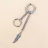 Bala B de búsqueda candente transfronteriza grupo juvenil a prueba de balas min Qiqi mismo estilo pendientes cadena alas borla tachuelas para la oreja Productos de hilo para la oreja