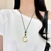 Colar pingente anel gota d'água oco longo para mulheres, corrente de suéter de luxo leve de nicho de alta qualidade com acessório de cordão preto ajustável
