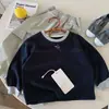 Camiseta Básica Delgada de Manga Larga con Cuello Redondo para Niños 2026 Nuevo Estilo de Otoño para Niños y Niñas Sudadera Coreana Casual Versátil de Moda