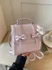 Mochila de Doble Hombro con Lazo para Mujer 2026 Nuevo Estilo Popular Moderna para Estudiante Viaje Diario Escolar Mochila Estilo Universitario