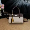 Bolso retro de alta calidad con diseño de nicho para mujer, nueva colección 2026, bolso versátil de moda transfronterizo, bolso de hombro y bolso tote