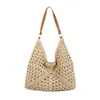 Bolsa tejida popular de celebridad de internet de gran capacidad para mujer 2026 Verano Nuevo Bolso de hombro único de paja Informal Bolso de playa para el mar