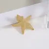 Pinza para el pelo de diseño europeo y americano imitación estrella de mar para mujer, a la moda, único, simple, pasador estilo Ins, accesorio para el pelo versátil de nicho, venta al por mayor