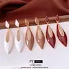 Pendientes Largos Huecos con Forma de Gota de Aceite Plata Moda Europea y Americana Personalidad Sencilla Versátiles Pendientes Elegantes de Gama Alta para Mujer