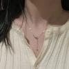 Collar de gota de agua de la suerte para mujer, estilo moderno, ligero, lujoso, diseño de nicho, colgante de cadena de clavícula con borlas simples a la moda.