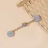 Botón Qipao nuevo estilo nacional chino botón de rana hilo tejido a mano envuelto en hilo bobina de cuenta dorada incienso doble botón cola larga botón de tela de una sola letra accesorios