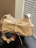 Bolsa de Ombro Plissada para o Trabalho Feminina 2026 Nova Moda Bolsa Transversal com Laço Bolsa de Mão de Alto Valor