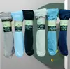 Venta al por mayor de fábrica calcetines para hombre y mujer engrosados alargados calcetines de acero transpirables primavera, verano y otoño alargados Calcetines Negros