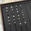 Nuevos y modernos aretes de cruz con diamantes completos Jiuhan para mujer, ear cuffs de acero de titanio de nicho, populares tachuelas de hueso de la oreja de alta gama