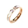Anillo de acero de titanio nácar blanco para mujer, diseño de nicho, anillo de banda lisa de alta gama, anillo de pareja, anillo de dedo meñique, anillo de dedo índice de lujo ligero