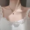Collar de luna de diamante negro de plata s925 con personalidad sencilla, cadena de clavícula corta de lujo, estilo coreano, rojo, moderno y ligero, para mujer.