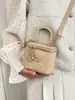 Bolsos pequeños populares de verano para mujer 2026 nuevo bolso versátil de cadena cruzado bolso de mano de moda bolso cuadrado pequeño tipo caja