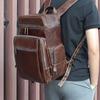 Mochila de Ombro Retrô Europeia e Americana Personalizada em Couro Genuíno Mochila Casual Quadrada Vertical Bolsa de Viagem Couro Encerado Masculino