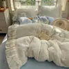 Conjunto de cuatro piezas de terciopelo de leche estilo girlish suave clase A con ribete de encaje floral pequeño estilo falda de cama conjunto de tres piezas grueso y cálido 1