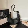Bolsa de mão de alta qualidade para mulheres 2026 nova moda primavera luxo leve nicho bolsa de ombro única sob o braço para trabalho bolsa transversal tipo bolinho
