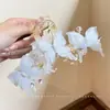 Elegante pinza de garra floral para peinado semi-recogido, nuevo modelo 2026 para mujer, pinza de tiburón de tamaño mediano para la parte trasera de la cabeza, accesorio para el cabello