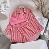 Enviado. Conjunto de Duas Peças Camisa Listrada Transfronteiriça para Mulheres Outono 2025 Sudeste Asiático, Conjunto de Camisa Solta Plus Size para Mulheres