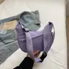 Bolso bandolera sencillo de estilo japonés y gran capacidad para mujer 2025 Verano Nuevo Estudiante Bolso de hombro pequeño Bolso dumpling de tela para mujer