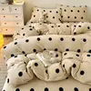 Juego de ropa de cama vintage de cuatro piezas estilo francés de terciopelo de leche con colcha, sábana acolchada de franela de doble cara engrosada para invierno y funda de edredón