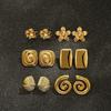 Aretes Transfronterizos Europeos y Americanos de Acero Inoxidable Oro de 18K Textura Geométrica Flor Aretes de Lujo Ligero Aretes Amazon AliExpress