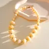 Collar de cuentas acrílicas de colores irregulares transfronterizo europeo y americano, cadena para la clavícula estilo festivo, accesorio de lujo ligero de alta gama para mujer