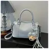 Nuevo bolso de mano estilo dulce de moda coreana transfronterizo, bolso tipo almohada, versátil para ir al trabajo, con un toque de alta gama y elegancia, bolso cruzado para mujer