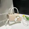 Bolsa Feminina de Luxo 2025 Simples para o Dia a Dia Decoração com Cinto Costura da Moda Cor Pura Ombro Único Transversal de Mão Pequena Quadrada