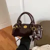 Bolso de mano de lujo nicho de alta gama para mujer, nuevo bolso de hombro y cruzado retro de moda para verano 2026