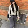 Camiseta básica de manga larga de algodón puro para mujer, de color liso, a la moda, versátil, elegante y muy atractiva para primavera, otoño e invierno