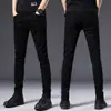 Jeans de Mezclilla Negro Puro Hong Kong para Hombre Verano 2026 Nuevos Elásticos Ajustados Pierna Cónica Estilo Coreano Modernos Delgados Pantalones Largos