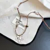 Colar de Florzinha Pequena com Contas em Corda Trançada Feminino Outono Retro Puxar Ajustável Acessórios Corrente de Suéter Longa Personalizada Versátil