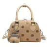 Bolsa feminina transfronteiriça poá bolsa de ombro único transversal estilo coreano super quente bolsa de mão feminina para o trabalho versátil do dia a dia bolsa de nicho