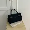 Bolso de Mano con Textura Transfronteriza para el Día a Día 2026 Nuevo Retro Simple Versátil Moda Gran Capacidad Bolso de Mujer