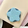 Superventas transfronterizo soporte magnético con airbag en forma de corazón con estampado de lunares de dibujos animados, soporte magnético para teléfono retráctil y plegable