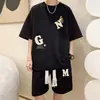Traje Deportivo Trendy de Waffle Talla Grande 2025 Estilo Hong Kong Verano Conjunto de Camiseta y Shorts de Manga Corta Conjunto de Dos Piezas para Hombre y Mujer