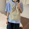 Mochila nueva para viajes diarios, mochila casual simple para el trabajo con bolsillos, versátil y ligera 2026