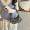 En stock estampado de corazón pana bolso de axila mujer plisado con cordón correa elástica bolso de mano bolso pequeño dulce bolso de un solo hombro