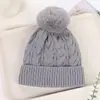Bestseller transfronterizo de invierno: gorro tejido grueso con forro de polar y pompón, gorro clásico de punto trenzado versátil, gorro de lana de color liso a la moda