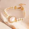 Pulsera Exquisita Francesa de Doble Capa con Perlas, Lujo Ligero, Pulsera de Temperamento de Moda de Gama Alta, Joyería de Mano de Diseño de Nicho