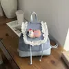 Bolso de mano de moda para niña estilo coreano 2026 nuevo diseño de nicho mochila personalizada de moda simple