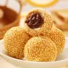 Snacks de pastel de arroz glutinoso frito Qianwei Yangchu, bolitas de sésamo semiacabadas, rollitos de primavera, pasteles de taro, camote y calabaza, productos de Año Nuevo