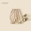 Pantalones de algodón puro para niña otoño 2026 nuevo modelo pantalones largos para niño estilo casual con puño clase A ropa para niño 5