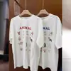 Camiseta Retro Estilo Americano Estampada Manga Curta Design Feminino Senso de Design Nicho Estilo Ocidental Simples Fina de Algodão Top de Ombro