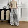 Pantalones de cuadros con degradado en blanco y negro de pierna ancha para hombre, verano, corte holgado, estilo BF, pantalones casuales fluidos, pantalones casuales americanos de pierna curva