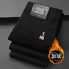 Marca Italiana de Alta Qualidade Tendência Outono e Inverno Juventude Elástico Slim Reto Jeans Preto Estampado de Veludo Espessado para Homens